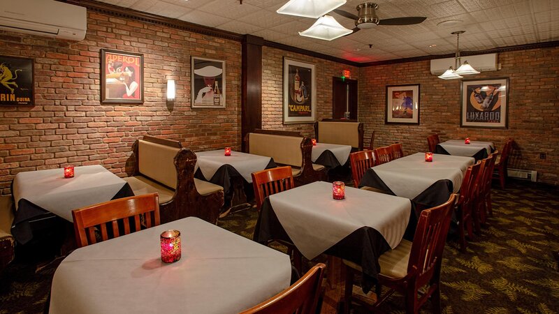 Restaurant interior with set tables and booths