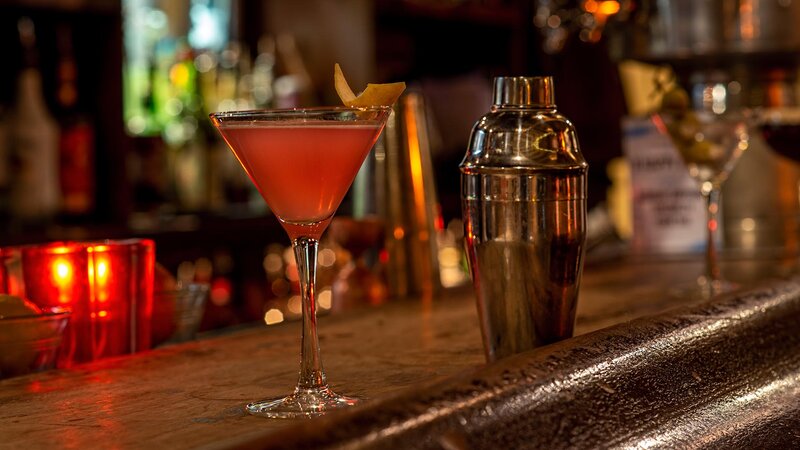 Pink cocktail in a martini glass